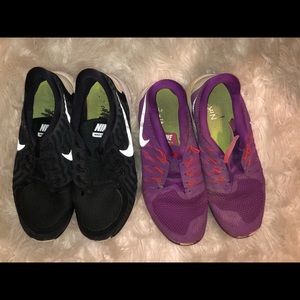 2 pairs of Nike running shoes